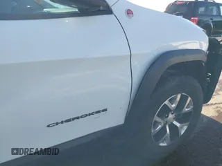 2018 Jeep Cherokee Trailhawk with VIN 1C4PJMBX7JD550173, listed as a IAAI auction lot 41094306 with 74,128 mi miles. Bid and sale history available at carsss.com. Image 18.