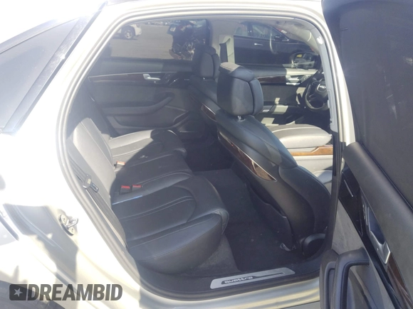 2017 Audi A8 with VIN WAU44AFD3HN014802, listed as a IAAI auction lot 42573537 with 121,096 mi miles and . Bid and sale history available at DreamBid. Image 8.