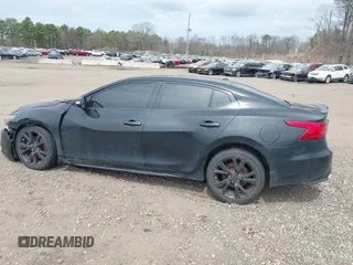 2016 Nissan Maxima SL with VIN 1N4AA6APXGC420735, listed as a IAAI auction lot 41972436 with 148,140 mi miles and . Bid and sale history available at DreamBid. Image 14.