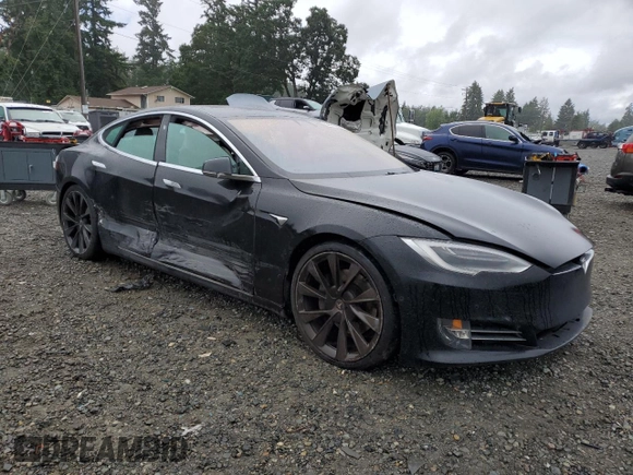 2019 Tesla Model S 75D with VIN 5YJSA1E28KF349241, listed as a Copart auction lot 55279595 with 77,005 mi miles and Salvage title. Bid and sale history available at DreamBid. Image 4.