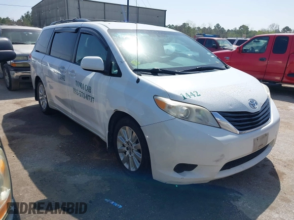 2014 Toyota Sienna LE with VIN 5TDJK3DC5ES081232, listed as a IAAI auction lot 41789629 with 397,033 mi miles and . Bid and sale history available at DreamBid. Image 1.