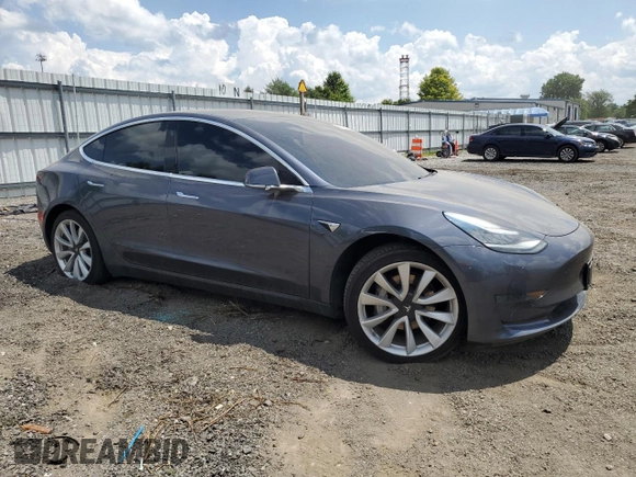 2020 Tesla Model 3 Standard Range Plus with VIN 5YJ3E1EA6LF614045, listed as a Copart auction lot 65222584 with 59,823 mi miles and Salvage Title. Bid and sale history available at DreamBid. Image 4.