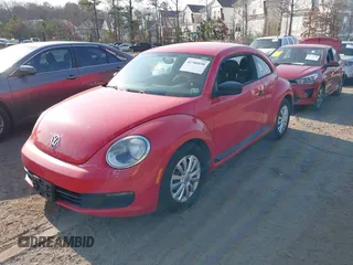 2012 Volkswagen Beetle Entry PZEV with VIN 3VWFP7AT8CM646053, listed as a IAAI auction lot 41700898 with 135,525 mi miles. Bid and sale history available at carsss.com. Image 2.