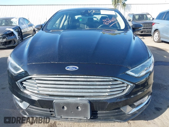 2017 Ford Fusion Energi SE with VIN 3FA6P0PU0HR129792, listed as a IAAI auction lot 41104376 with 86,659 mi miles. Bid and sale history available at carsss.com. Image 6.