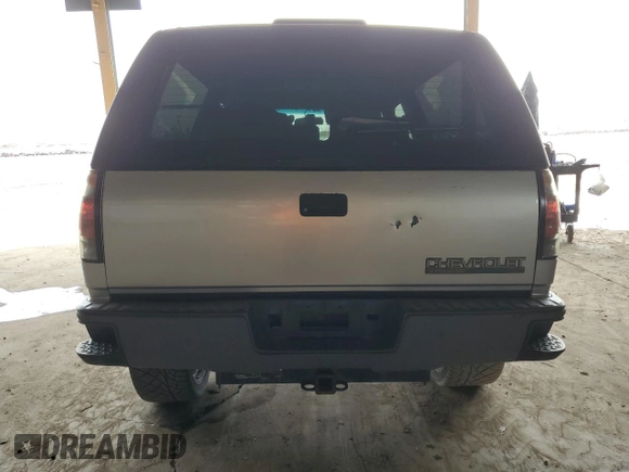 1998 Chevrolet Tahoe with VIN 3GNEC18R3WG122904, listed as a Copart auction lot 57752554 with 229,646 mi miles and Salvage title. Bid and sale history available at DreamBid. Image 6.