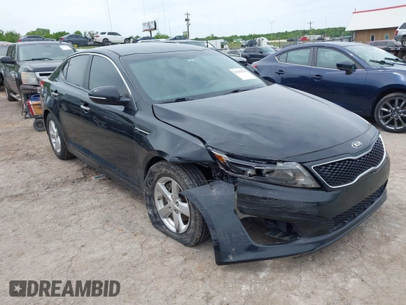 2015 Kia Optima LX z VIN 5XXGM4A70FG517585, wystawiony jako IAAI lot #42193594 z przebiegiem 155 118 mil mil oraz . Historia ofert i sprzedaży dostępna na DreamBid. Obrazek 1.