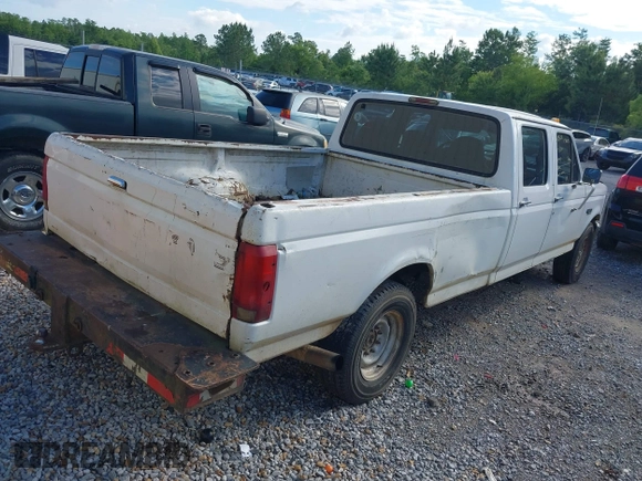 1997 Ford F-350 with VIN 1FTJW35F9VEC78035, listed as a IAAI auction lot 42183452 with Not Provided miles and . Bid and sale history available at DreamBid. Image 4.