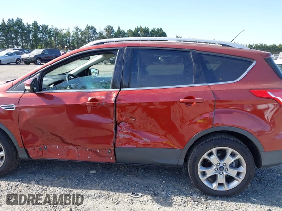 2016 Ford Escape Titanium with VIN 1FMCU9JX9GUA16892, listed as a IAAI auction lot 42110986 with 87,775 mi miles and . Bid and sale history available at DreamBid. Image 14.