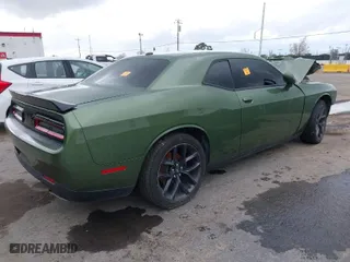 2020 Dodge Challenger SXT with VIN 2C3CDZAG7LH134915, listed as a IAAI auction lot 40704472 with 92,142 mi miles. Bid and sale history available at carsss.com. Image 4.