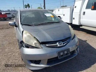 2009 Honda Fit Sport w/Navi with VIN JHMGE88619S020572, listed as a IAAI auction lot 41755126 with 202,358 mi miles. Bid and sale history available at carsss.com. Image 1.