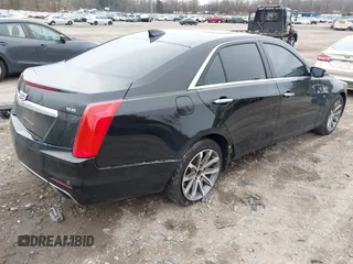 2016 Cadillac CTS Luxury Collection AWD with VIN 1G6AX5SS9G0194228, listed as a IAAI auction lot 41504476 with 94,573 mi miles and . Bid and sale history available at DreamBid. Image 4.