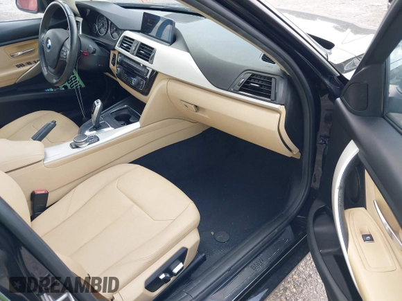 2018 BMW 3 Series 320i with VIN WBA8E1G57JNU88781, listed as a IAAI auction lot 42019246 with 56,820 mi miles. Bid and sale history available at carsss.com. Image 5.