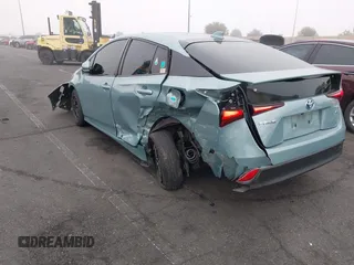 2022 Toyota Prius L Eco with VIN JTDKAMFU9N3186859, listed as a IAAI auction lot 41486941 with 122,665 mi miles and . Bid and sale history available at DreamBid. Image 6.