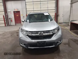 2017 Honda CR-V Touring with VIN 2HKRW2H90HH603307, listed as a IAAI auction lot 41868564 with 81,144 mi miles. Bid and sale history available at carsss.com. Image 12.