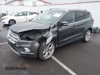 2019 Ford Escape Titanium with VIN 1FMCU9J99KUA64158, listed as a IAAI auction lot 41980102 with 52,514 mi miles. Bid and sale history available at carsss.com. Image 2.