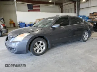 2009 Nissan Altima 2.5 with VIN 1N4AL21EX9N401207, listed as a Copart auction lot 52074955 with 155,558 mi miles and Salvage Title. Bid and sale history available at carsss.com. Image 1.