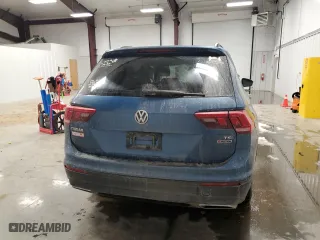 2018 Volkswagen Tiguan S with VIN 3VV0B7AX9JM034033, listed as a Copart auction lot 43441295 with 127,719 mi miles and Salvage Title. Bid and sale history available at carsss.com. Image 6.