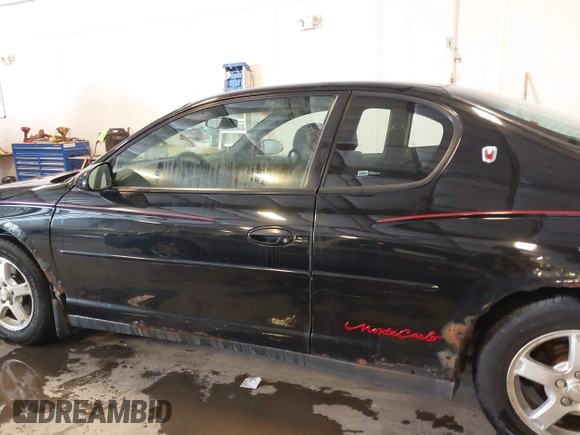 2003 Chevrolet Monte Carlo LS with VIN 2G1WW12E739183648, listed as a IAAI auction lot 41534454 with 143,464 mi miles. Bid and sale history available at carsss.com. Image 14.