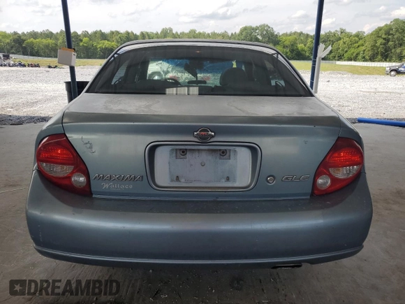 2000 Nissan Maxima GXE with VIN JN1CA31A1YT223132, listed as a Copart auction lot 60148655 with 269,258 mi miles and Salvage title. Bid and sale history available at DreamBid. Image 6.