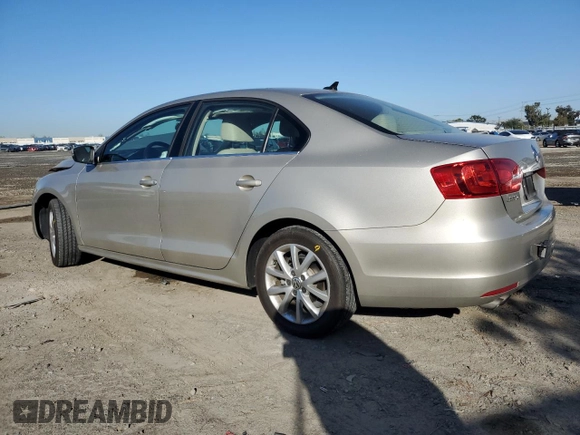 2014 Volkswagen Jetta SE with VIN 3VWD17AJ2EM240795, listed as a Copart auction lot 49749455 with 73,389 mi miles and Salvage title. Bid and sale history available at DreamBid. Image 2.