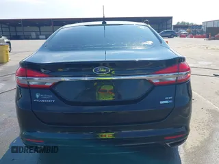 2017 Ford Fusion SE with VIN 3FA6P0T94HR321704, listed as a IAAI auction lot 42253691 with 129,115 mi miles and . Bid and sale history available at DreamBid. Image 16.