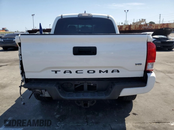 2017 Toyota Tacoma SR5 with VIN 3TMAZ5CNXHM041159, listed as a Copart auction lot 52250905 with 99,337 mi miles and Salvage Title. Bid and sale history available at DreamBid. Image 6.