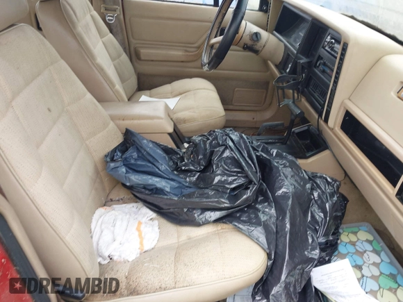 1994 Jeep Cherokee Sport z VIN 1J4FJ68S2RL171628, wystawiony jako IAAI lot #42635451 z przebiegiem 278 677 mil mil oraz . Historia ofert i sprzedaży dostępna na DreamBid. Obrazek 5.