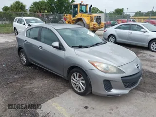 2012 Mazda 3 i Touring z VIN JM1BL1V74C1566172, wystawiony jako IAAI lot #42435843 z przebiegiem Nie podano mil oraz . Historia ofert i sprzedaży dostępna na DreamBid. Obrazek 1.