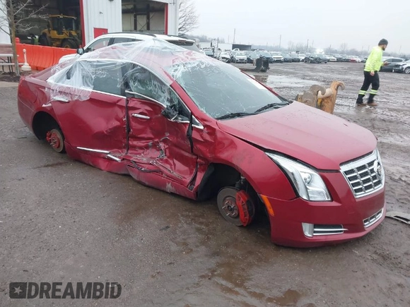 2013 Cadillac XTS Luxury with VIN 2G61R5S30D9157654, listed as a IAAI auction lot 41336844 with 159,419 mi miles and . Bid and sale history available at DreamBid. Image 1.