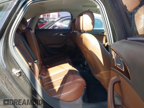 2016 Audi A6 Premium with VIN WAUCFAFC7GN162981, listed as a IAAI auction lot 42660005 with 148,038 mi miles and . Bid and sale history available at DreamBid. Image 8.