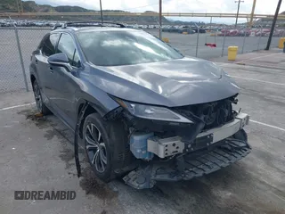 2020 Lexus RX with VIN 2T2HZMAA3LC153100, listed as a IAAI auction lot 41925188 with 104,216 mi miles. Bid and sale history available at carsss.com. Image 1.