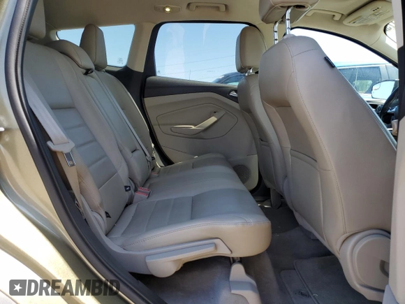 2013 Ford Escape SEL z VIN 1FMCU9H93DUD67848, wystawiony jako Copart lot #57221755 z przebiegiem 129 671 mil mil oraz Czysty tytuł • Clean title. Historia ofert i sprzedaży dostępna na DreamBid. Obrazek 11.