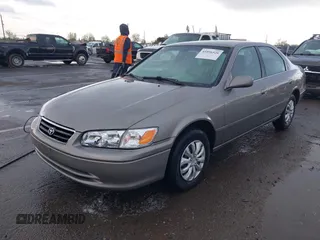 2000 Toyota Camry CE z VIN 4T1BG22K3YU691054, wystawiony jako IAAI lot #41896526 z przebiegiem 303 993 mil mil oraz . Historia ofert i sprzedaży dostępna na DreamBid. Obrazek 2.