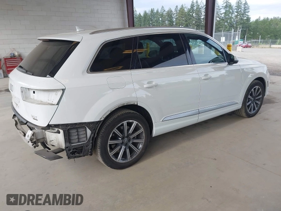 2017 Audi Q7 Premium with VIN WA1AAAF74HD006104, listed as a IAAI auction lot 42554741 with 95,276 mi miles and . Bid and sale history available at DreamBid. Image 4.