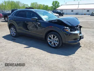2023 Mazda CX-30 S Preferred with VIN 3MVDMBCM0PM502576, listed as a IAAI auction lot 42206760 with 31,579 mi miles and . Bid and sale history available at DreamBid. Image 1.