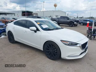 2018 Mazda 6 Grand Touring Reserve with VIN JM1GL1WY1J1321517, listed as a IAAI auction lot 39411226 with 50,280 mi miles and . Bid and sale history available at carsss.com. Image 1.