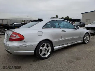 2004 Mercedes-Benz CLK-Class 5.0L with VIN WDBTJ75J04F110990, listed as a Copart auction lot 85511414 with 251,096 mi miles and Salvage Title. Bid and sale history available at carsss.com. Image 3.