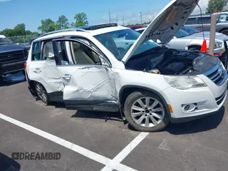 2010 Volkswagen Tiguan with VIN WVGAV9AX0AW510512, listed as a IAAI auction lot 42532527 with 193,910 mi miles and . Bid and sale history available at DreamBid. Image 6.