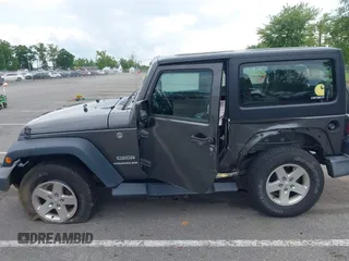 2016 Jeep Wrangler Willys Wheeler with VIN 1C4GJWAG2GL318981, listed as a IAAI auction lot 42390588 with 131,559 mi miles and . Bid and sale history available at DreamBid. Image 17.