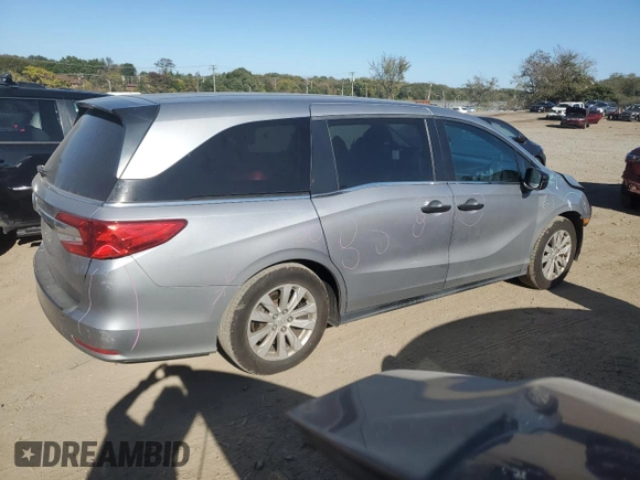 2018 Honda Odyssey LX with VIN 5FNRL6H22JB087152, listed as a Copart auction lot 76754974 with 73,057 mi miles and Salvage Title. Bid and sale history available at carsss.com. Image 3.