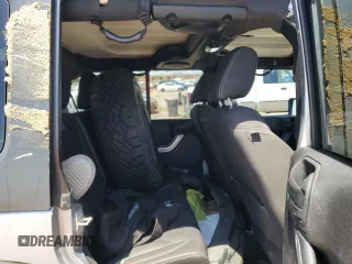 2014 Jeep Wrangler Unlimited Rubicon with VIN 1C4HJWFG1EL241014, listed as a Copart auction lot 63948655 with 165,650 mi miles and Salvage title. Bid and sale history available at DreamBid. Image 10.