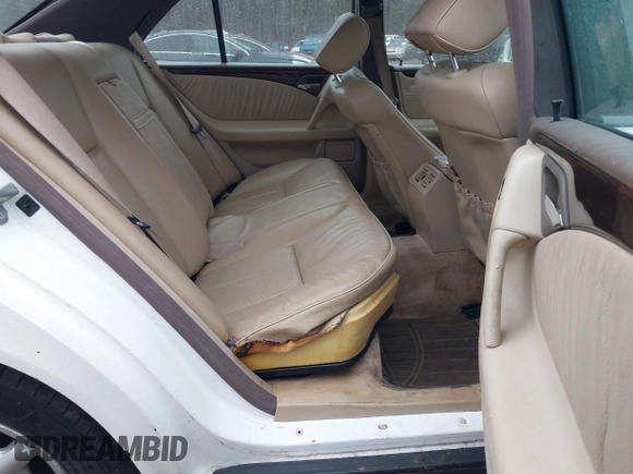 1997 Mercedes-Benz E-Class with VIN WDBJF55F4VA424262, listed as a IAAI auction lot 41462993 with 1 mi miles. Bid and sale history available at carsss.com. Image 8.