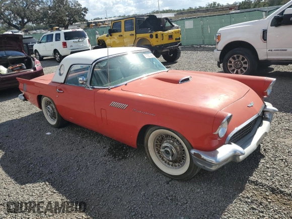 1957 Ford Thunderbird with VIN D7FH395675, listed as a Copart auction lot 77234434 with 15,312 mi miles and Salvage Title. Bid and sale history available at DreamBid. Image 4.