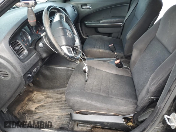 2013 Dodge Charger Police with VIN 2C3CDXAT7DH592408, listed as a Copart auction lot 54678835 with 180,084 mi miles and Salvage Title. Bid and sale history available at DreamBid. Image 7.