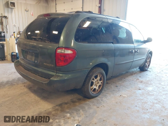 2003 Dodge Caravan Sport with VIN 2D4GP44L03R160365, listed as a IAAI auction lot 42223594 with 81,771 mi miles and . Bid and sale history available at DreamBid. Image 4.