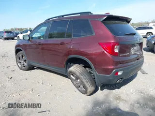 2021 Honda Passport Touring z VIN 5FNYF8H91MB022986, wystawiony jako IAAI lot #42077321 z przebiegiem 20 497 mil mil oraz . Historia ofert i sprzedaży dostępna na DreamBid. Obrazek 3.
