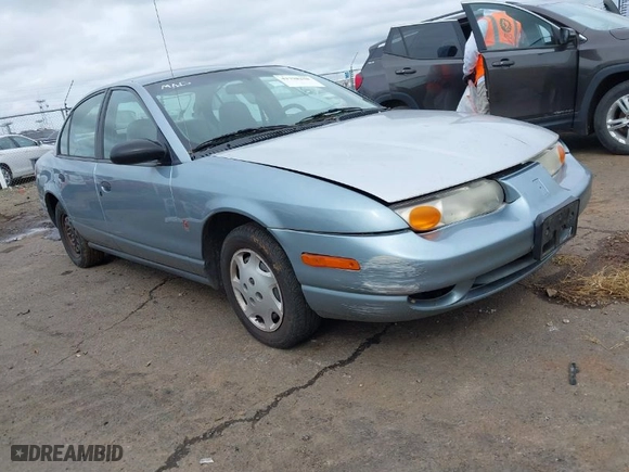 2002 Saturn SL with VIN 1G8ZH54862Z169073, listed as a IAAI auction lot 41798258 with 209,856 mi miles. Bid and sale history available at carsss.com. Image 1.
