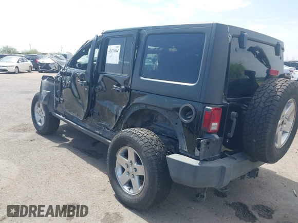 2011 Jeep Wrangler Unlimited Rubicon with VIN 1J4BA6H15BL580301, listed as a IAAI auction lot 42673014 with Not provided miles and . Bid and sale history available at DreamBid. Image 3.