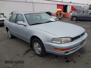 1994 Toyota Camry LE with VIN JT2SK12E2R0207688, listed as a IAAI auction lot 41323827 with 162,680 mi miles. Bid and sale history available at carsss.com. Image 1.