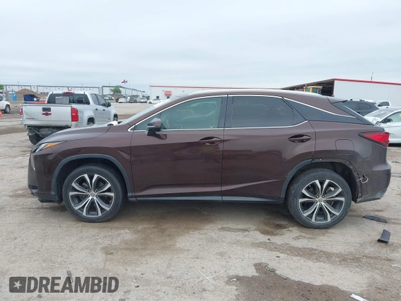 2016 Lexus RX 350 z VIN 2T2ZZMCA5GC029529, wystawiony jako IAAI lot #41953567 z przebiegiem 133 460 mil mil oraz . Historia ofert i sprzedaży dostępna na DreamBid. Obrazek 14.